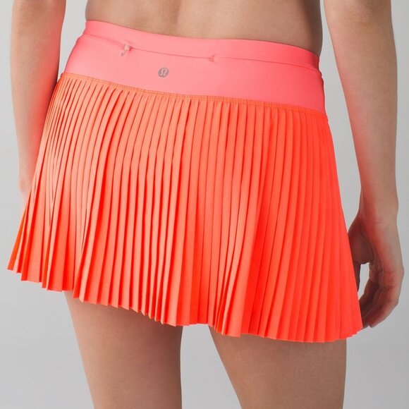 lululemon athletica Dresses & Skirts - Lululemon Pleat to Street Skirt Grapefruit 6